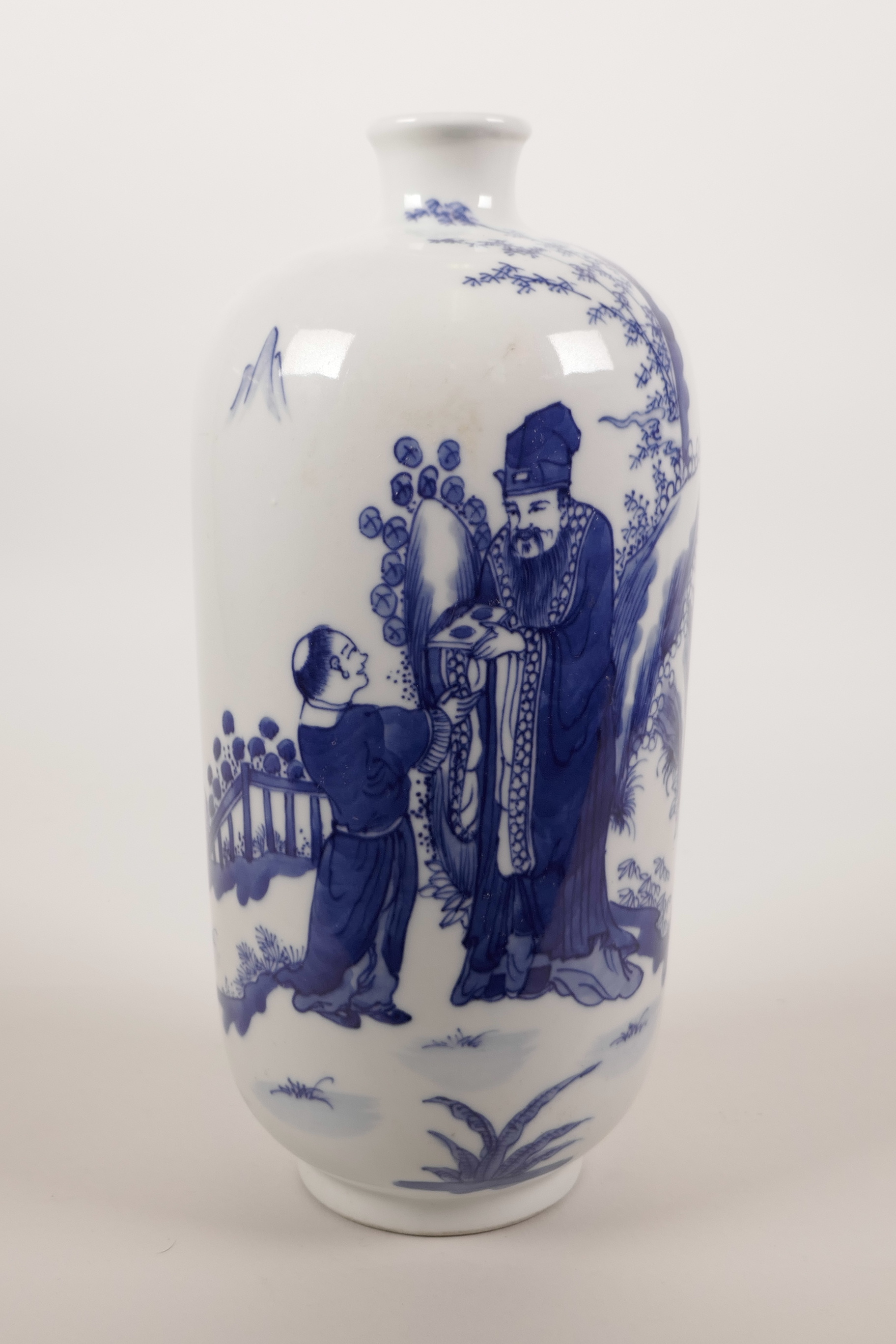 A Chinese blue and white porcelain vase decorated with a sage and his student, 6 character mark to