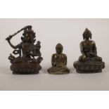A collection of three small Sino-Tibetan bronzes of Buddha and deities, double vajra mark to base,