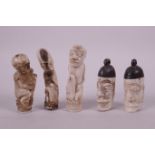 Three Oriental carved bone figures, together with two African bone containers with carved facial