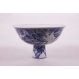 A Chinese blue and white porcelain stem bowl with twin dragon decoration, 6 character mark to
