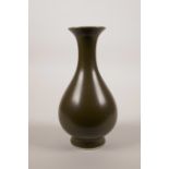 A Chinese tea dust glaze pear shaped vase, 7½" high