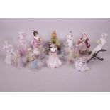 A collection of porcelain figures including Royal Doulton and Wedgwood