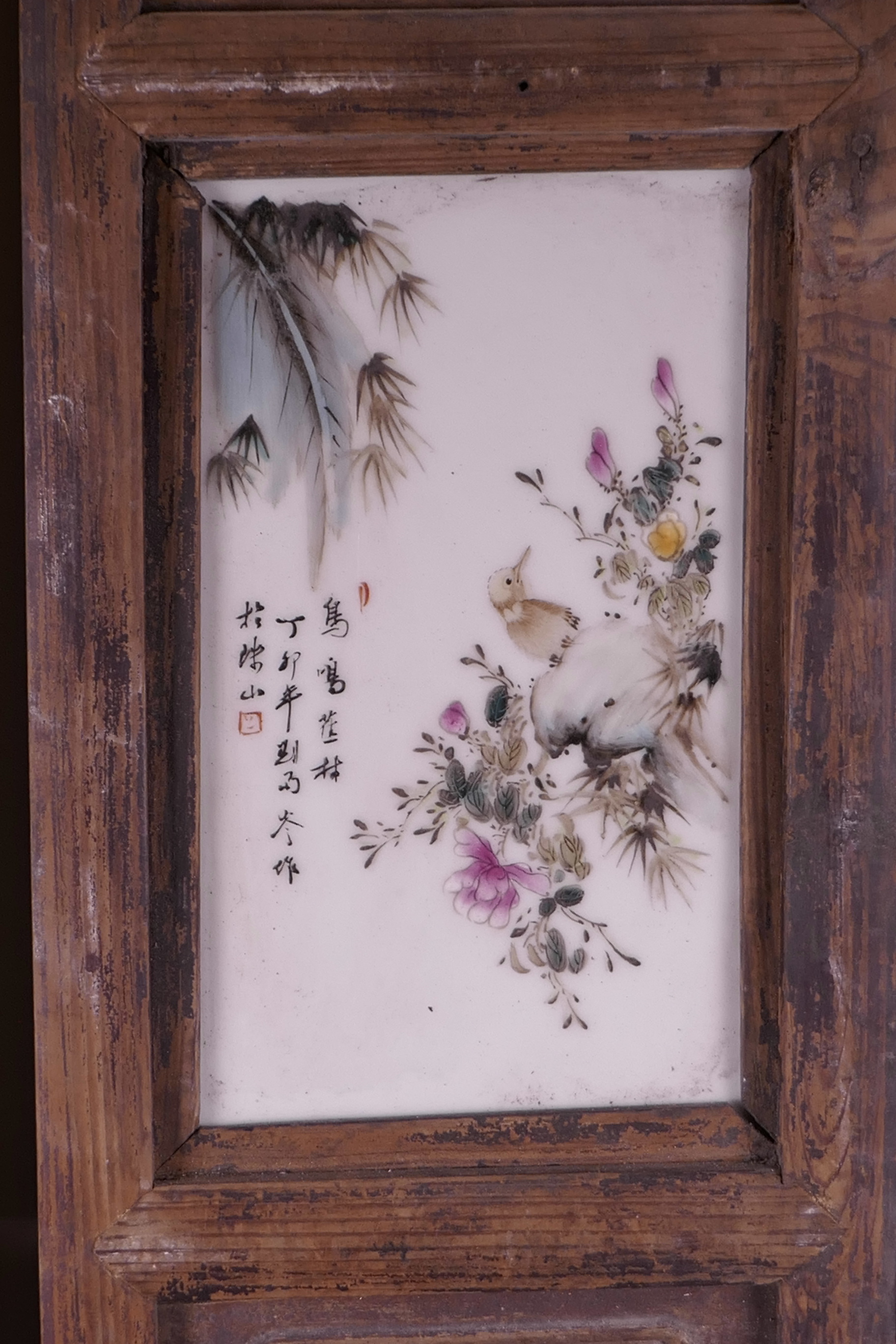 A pair of Chinese hardwood panels set with four polychrome enamelled porcelain panels depicting - Image 3 of 5