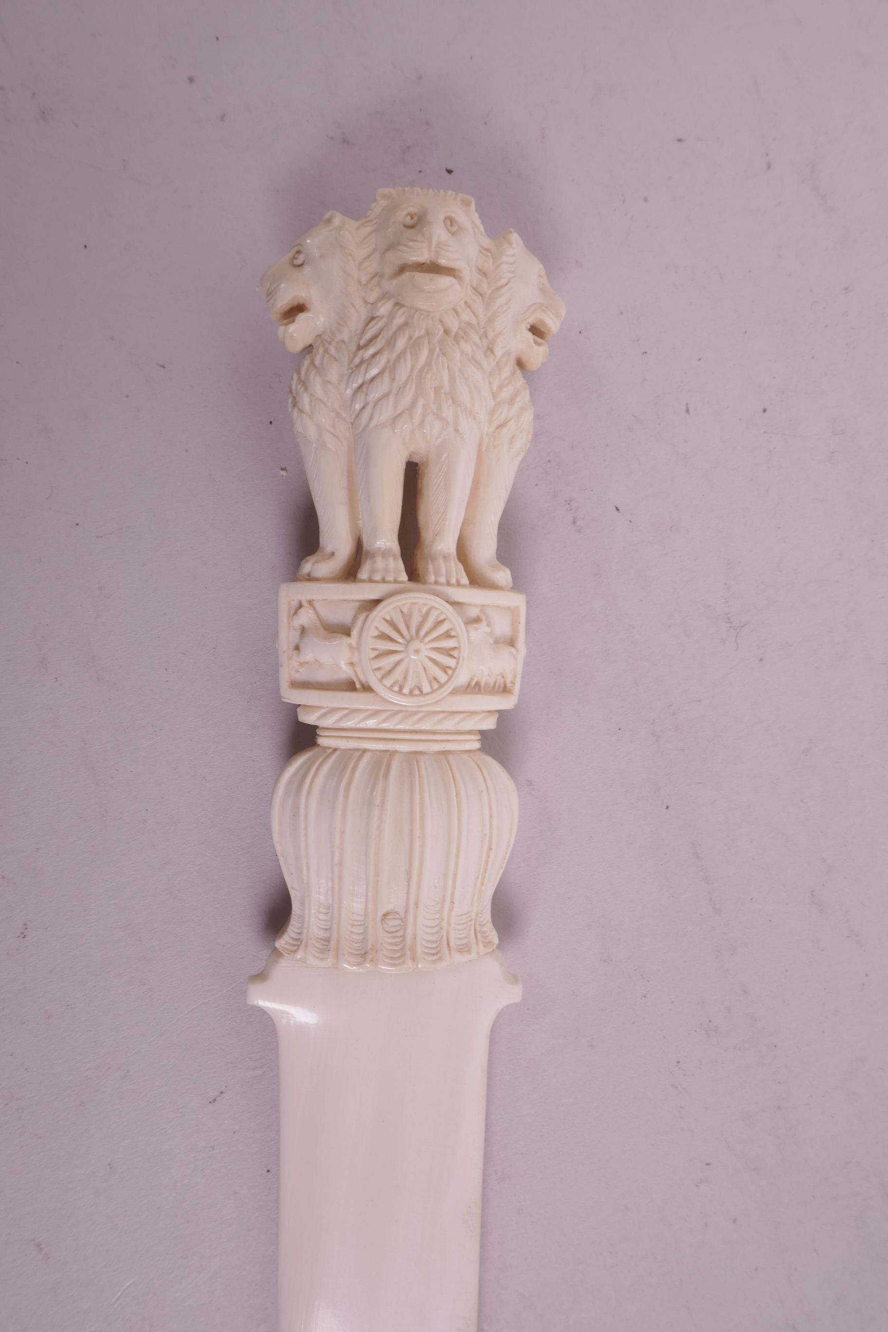 A late C19th/early C20th ivory letter opener, with carved handle in the form of three lions, 12" - Image 2 of 3