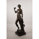 A bronze figure of Bacchus, after the sculpture by Michelangelo, signed E. Nahcepe, 18½" high