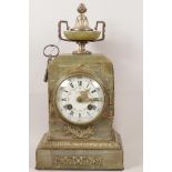 An onyx and ormolu mounted French mantel clock with floral painted white enamel dial and Roman