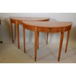 A pair of satinwood demi lune card tables with painted Adam style decoration, 45" x 19", 32" high