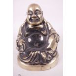 A cast brass figurine of Buddha seated in meditation, 5" high