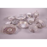 A collection of Dresden china with floral decoration including seven reticulated bonbon baskets,