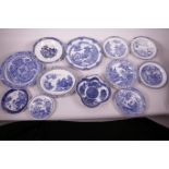 A quantity of mainly C19th blue and white porcelain plates including Worcester, Willow pattern etc