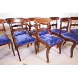A matched set of eight (six and two) Colonial hardwood dining chairs, with carved and reeded