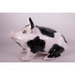 A large pottery pig by the Wemyss Griselda Hill Pottery, sponged black on white, 16" long, very A/F,