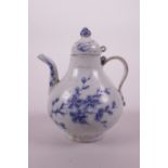 A Chinese Ming style blue and white pottery teapot with prunus blossom decoration, 5" high