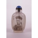 A Chinese reverse painted glass snuff bottle decorated with a portrait of an emperor, character