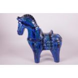 A vintage Italian studio pottery horse designed by Aldo Londi for Bitossi Ceramiche, glazed in
