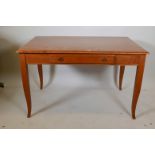 An Ethan Allen single drawer writing table raised on shaped (detachable) supports, 48" x 30" x 30"