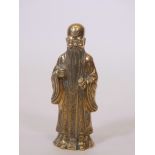 A polished brass figure of lohan, 9" high