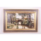 An oil on millboard, rural landscape with a bridge over a stream, labelled verso 'J.F. Slater RA',