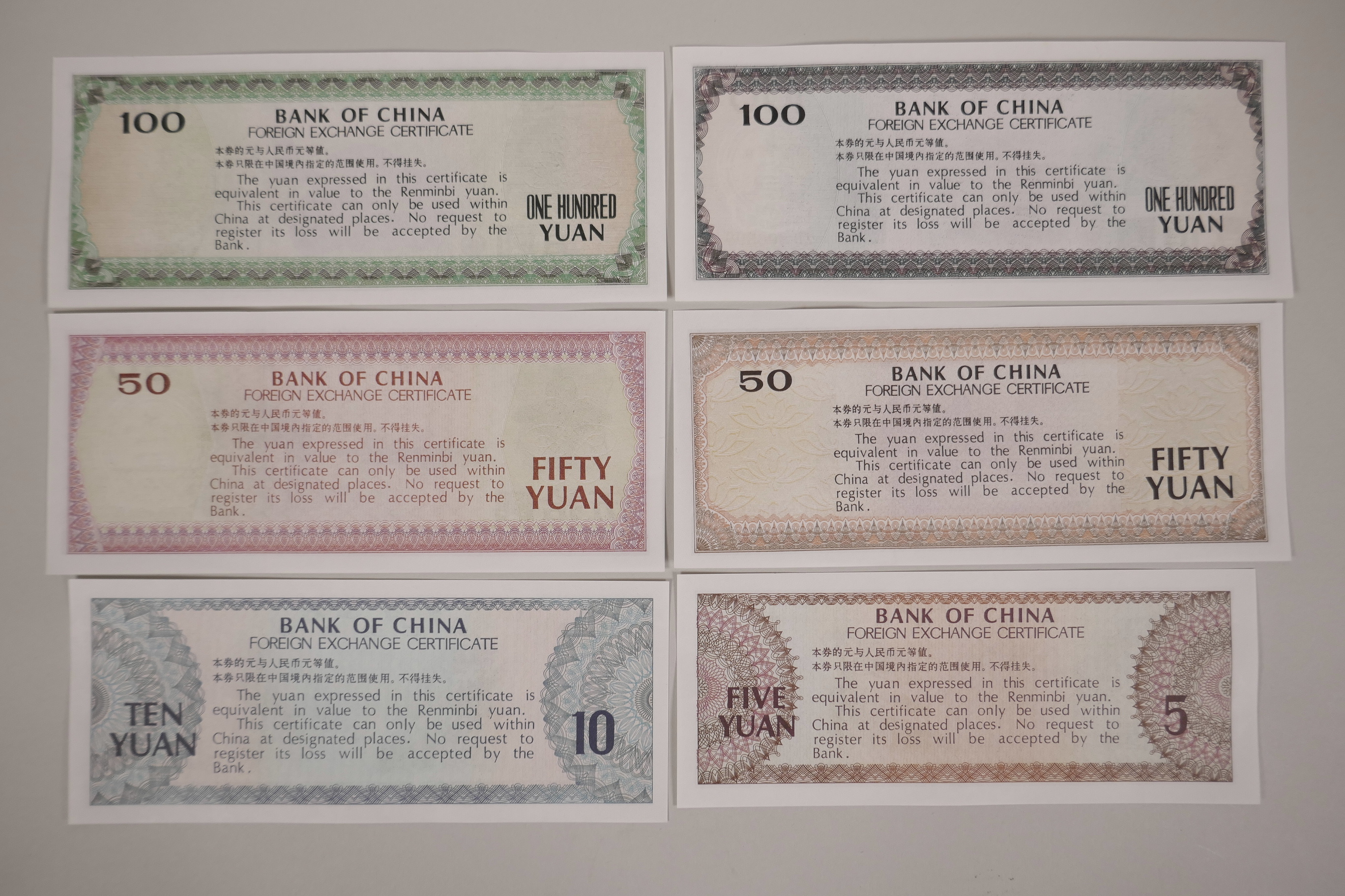 A set of six facsimile (replica) Chinese foreign exchange certificates, 6½" x 3" - Image 2 of 2