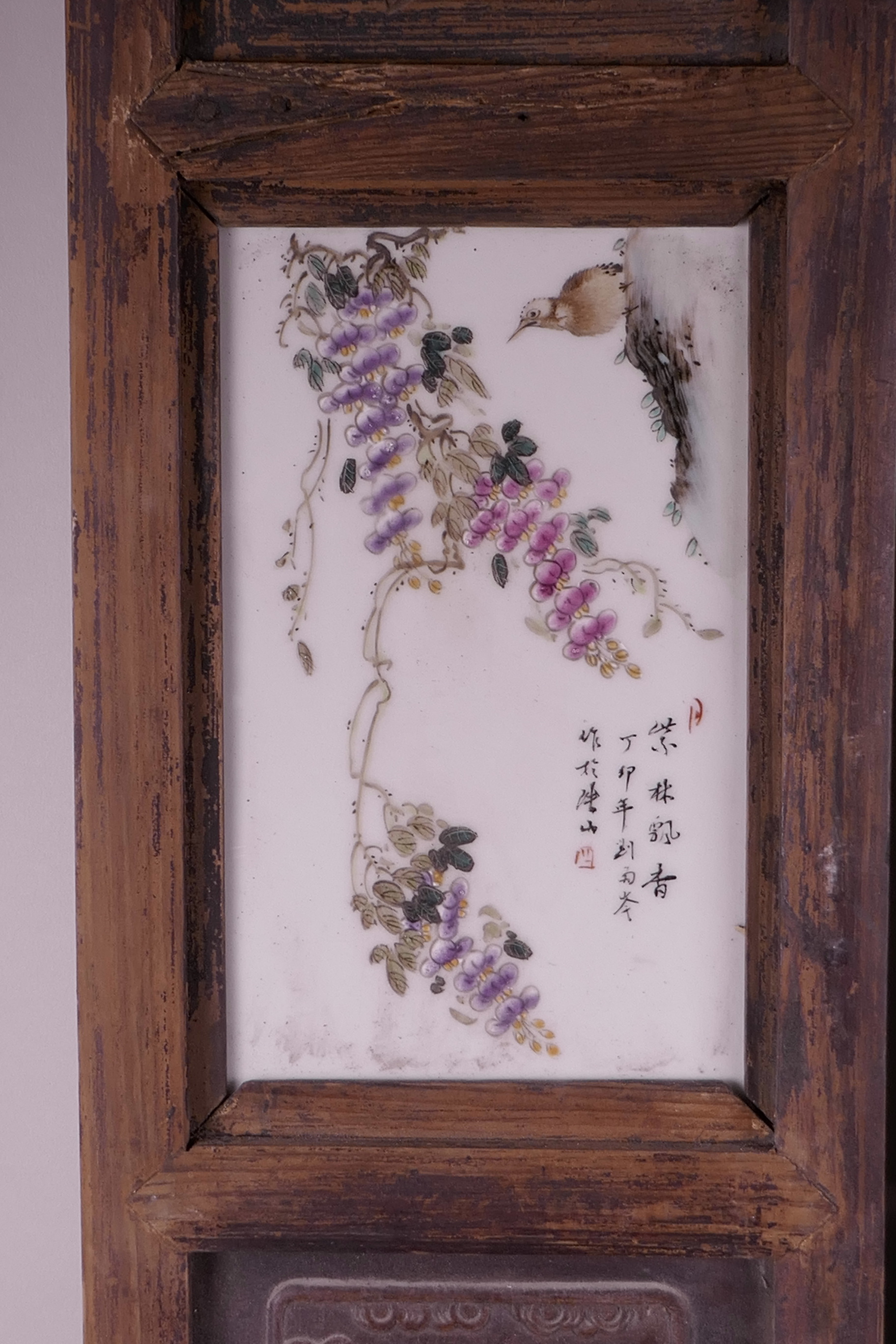 A pair of Chinese hardwood panels set with four polychrome enamelled porcelain panels depicting - Image 2 of 5