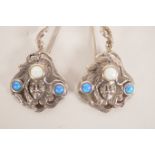 A pair of silver and opal Art Nouveau style earrings