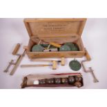 The International table croquet set by FH Ayres Ltd London (boxed), the boxwood mallets 9" long,