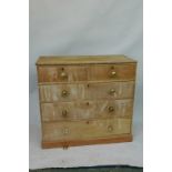 A Victorian stripped pine chest of two over three drawers, raised on a plinth base, 44" x 20" x 39"