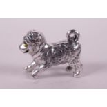 A novelty silver miniature figure of a dog, 1"