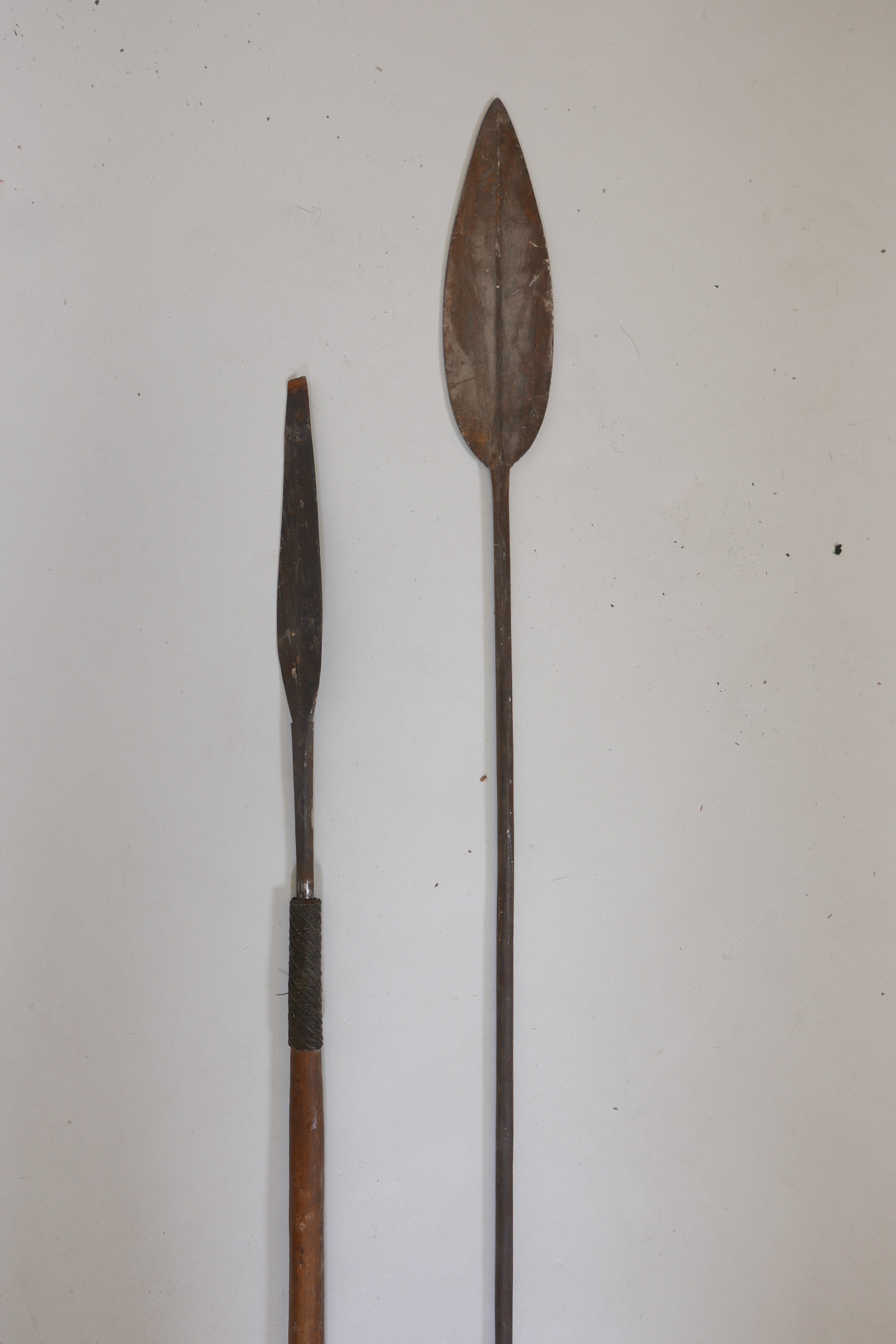 An East African tribal hunting spear and another smaller, longest 73"