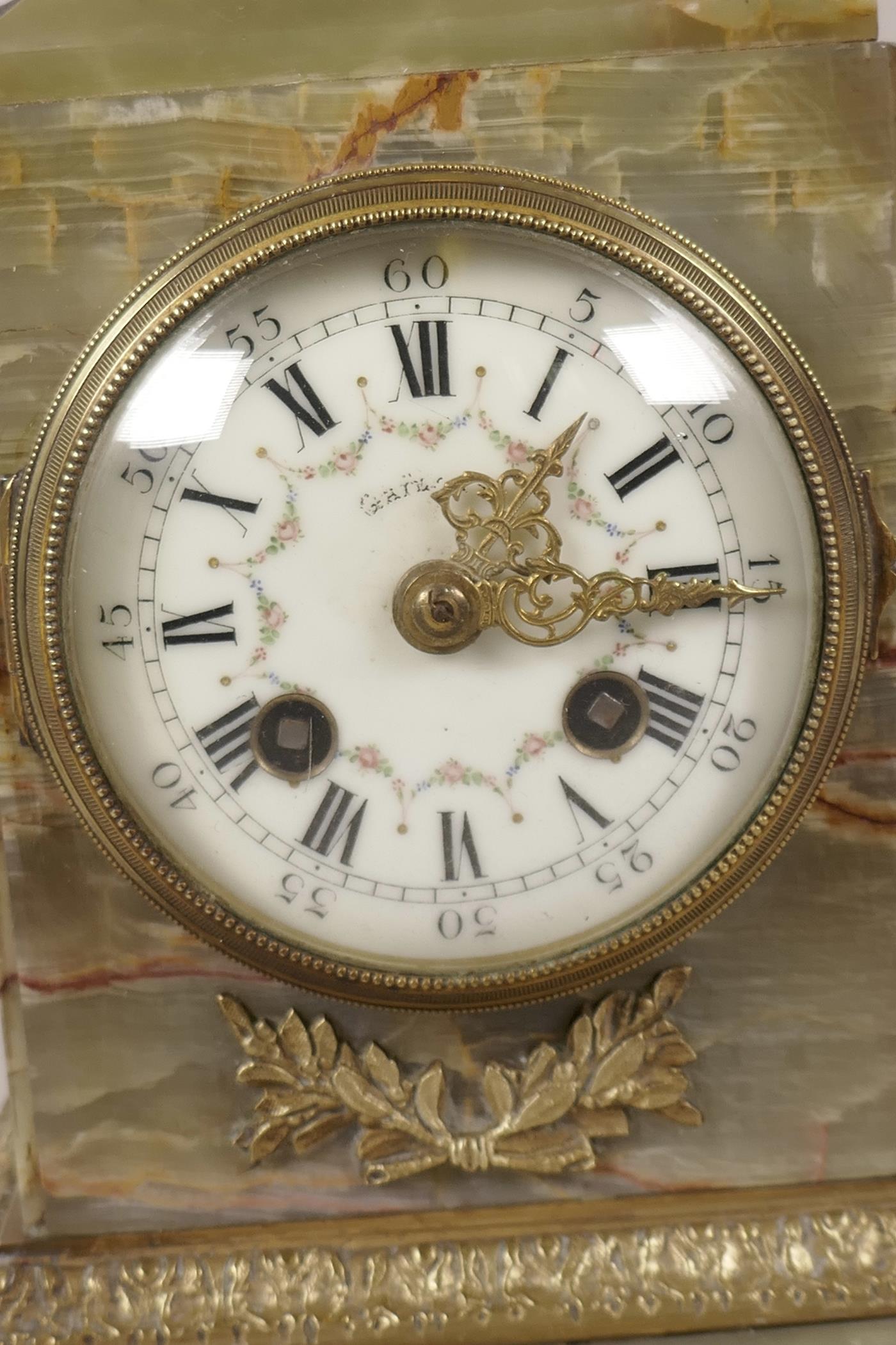 An onyx and ormolu mounted French mantel clock with floral painted white enamel dial and Roman - Image 2 of 3