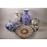 A Chinese blue and white porcelain lidded storage jar decorated with scrolling flowers, 8" high,