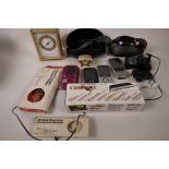 A box of miscellaneous items including mobile phones, bontemps, harmonica, designer sunglasses,