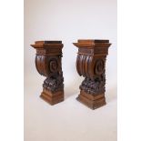 A pair of C17th French oak corbels/brackets, 27½" high, 13" x 10½"