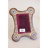 A silver gilt and enamel easel frame, inset with semi-precious stones, marked 84, mounted in a