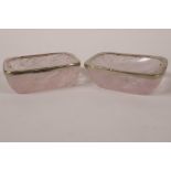 A pair of rose rock crystal table salts with white metal rims, 2½" x 2"