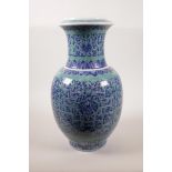 A large Chinese blue glazed porcelain vase with archaic style blue and white decoration, seal mark