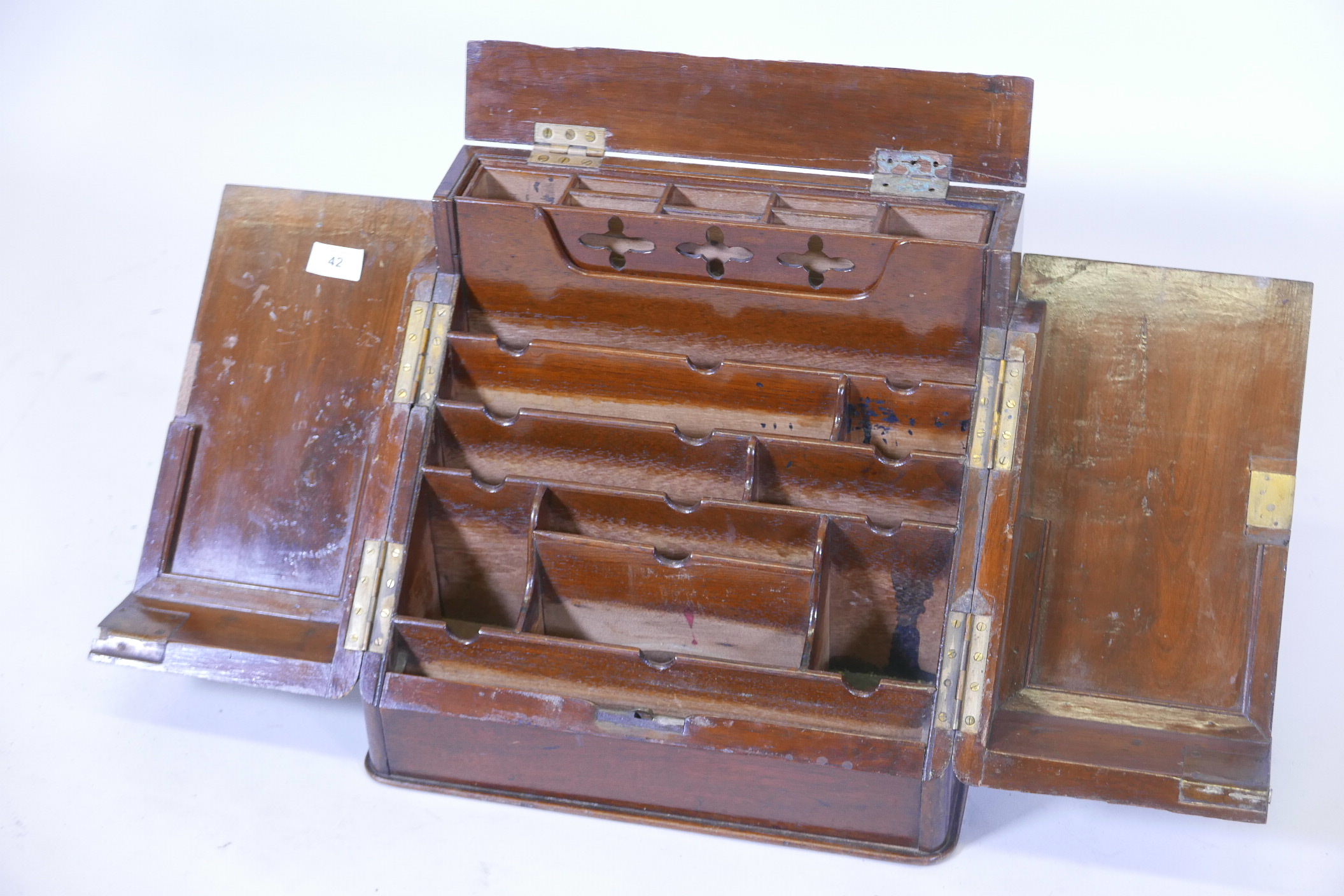 A Victorian mahogany stationery cabinet, with two doors opening to reveal a fitted interior, the top