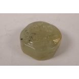 A Chinese green jade seal with carved dragon decoration to top, 2" x 2"