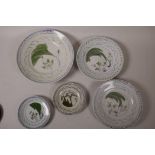 Five Oriental blue and white porcelain plates painted with leaves and flowers, one 8", two 6½",