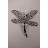 A silver brooch in the form of a dragonfly set with marcasite and semi precious stones, 3"