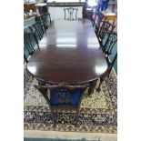 A C19th style mahogany drawleaf dining table with two extra leaves, legs removable, 48" x 77" x 114"