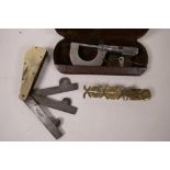 A Borthwick three blade bloodletting tool together with a Moore and Wright 0-1 micrometer and a