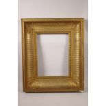 An early C19th gilt picture frame, having reeded decoration, rebate 10½" x 14"