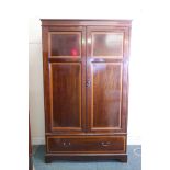 A C19th inlaid mahogany wardrobe, with satinwood banded decoration, the upper section with two