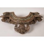 An antique carved wood cornice piece, 19" wide