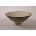 A Chinese crackle glazed pottery bowl of conical form, 6½" diameter