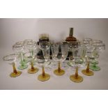 A retro train liqueur set, 16" long, together with a set of six brown stem gilt decorated