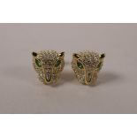 A pair of gilt silver and cubic zirconium set stud earrings in the form of panther heads