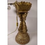A carved, gilt wood table lamp base, the base and crown in the form of lotus flowers, 19" high