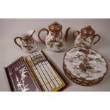 A Japanese Meiji Satsuma porcelain coffee pot, cream jug, sucrier and six matching teaplates,